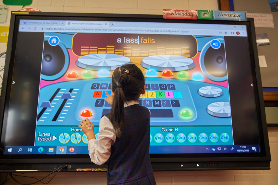 Student using the interactive board