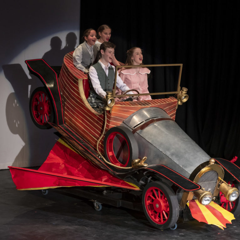 student performing in the school production of Chitty Chitty Bang Bang