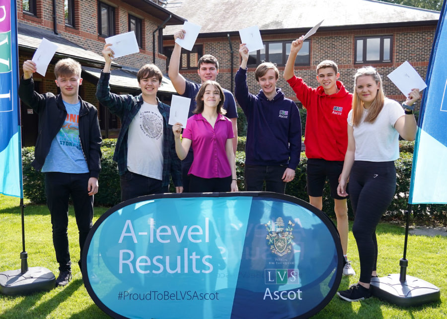students celebrating their A-Level results