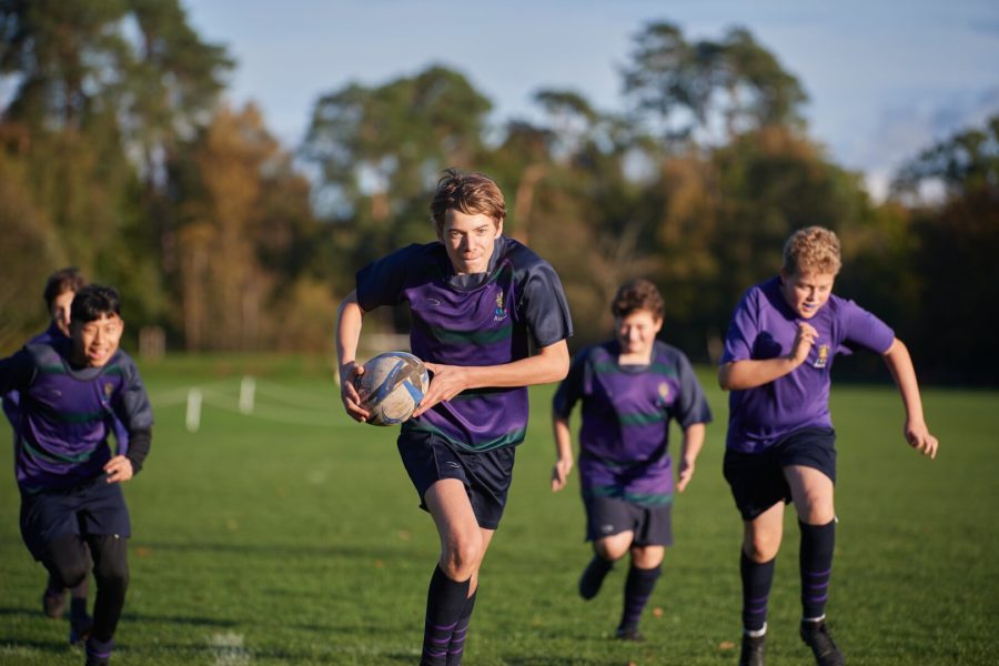 Students playing rugby