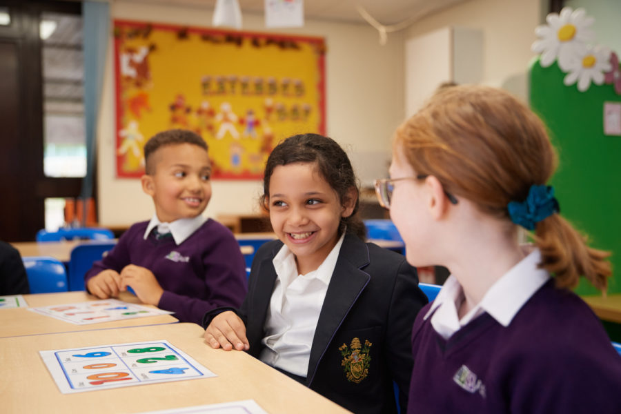 smiling junior school children